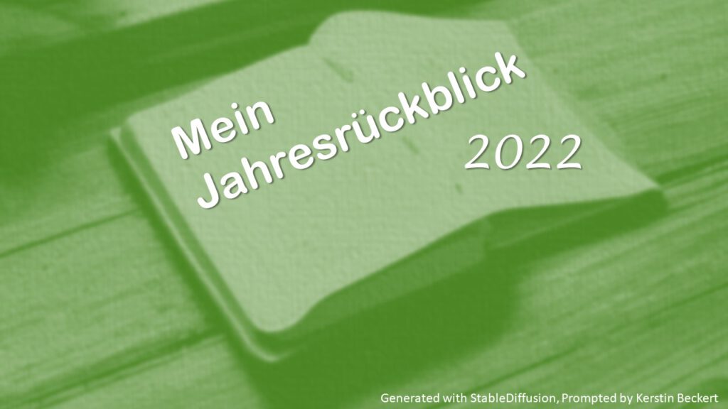 Ein aufgeschlagener Tagesterminer im Hintergrund. Im Vordergrund der Text: "Mein Jahresrückblick 2022". Farbe des Bildes ist Grün.